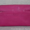 avant pochette portée travers compagnon femme en cuir fuschia