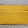 avant pochette portée travers compagnon femme en cuir jaune