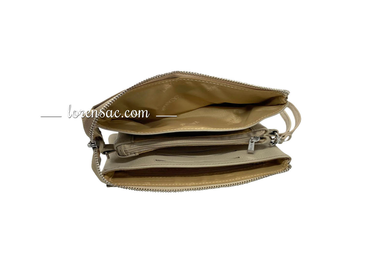 Intérieur de la pochette portée travers compagnon cuir de couleur beige