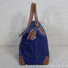 Profil du sac petit format en cuir et nylon bleu