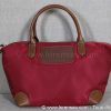 Face avant du sac petit format en cuir et nylon Rouge