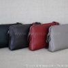 ensemble des 4 couleurs gris rouge chocolat et noir de la Pochette femme bandoulière en cuir véritable