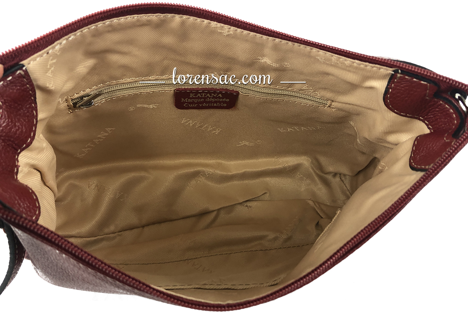 Intérieur du petit sac cuir femme rouge avec doublure beige Intérieur petit sac cuir femme rouge doublure beige