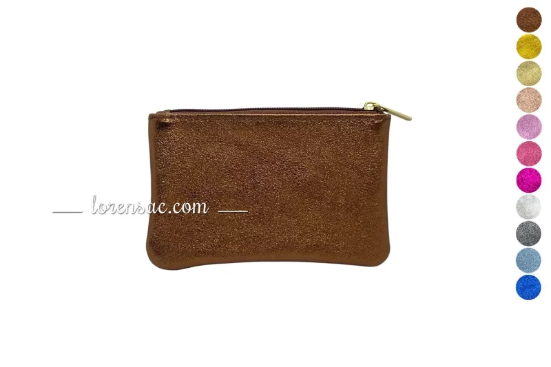 Petit porte-monnaie femme en cuir, accessoire élégant et pratique pour ranger la monnaie avec style.